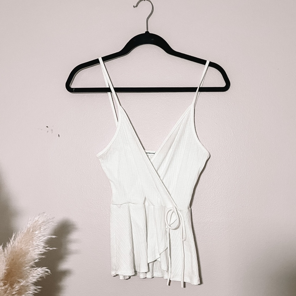 Caution to the wind wrap top